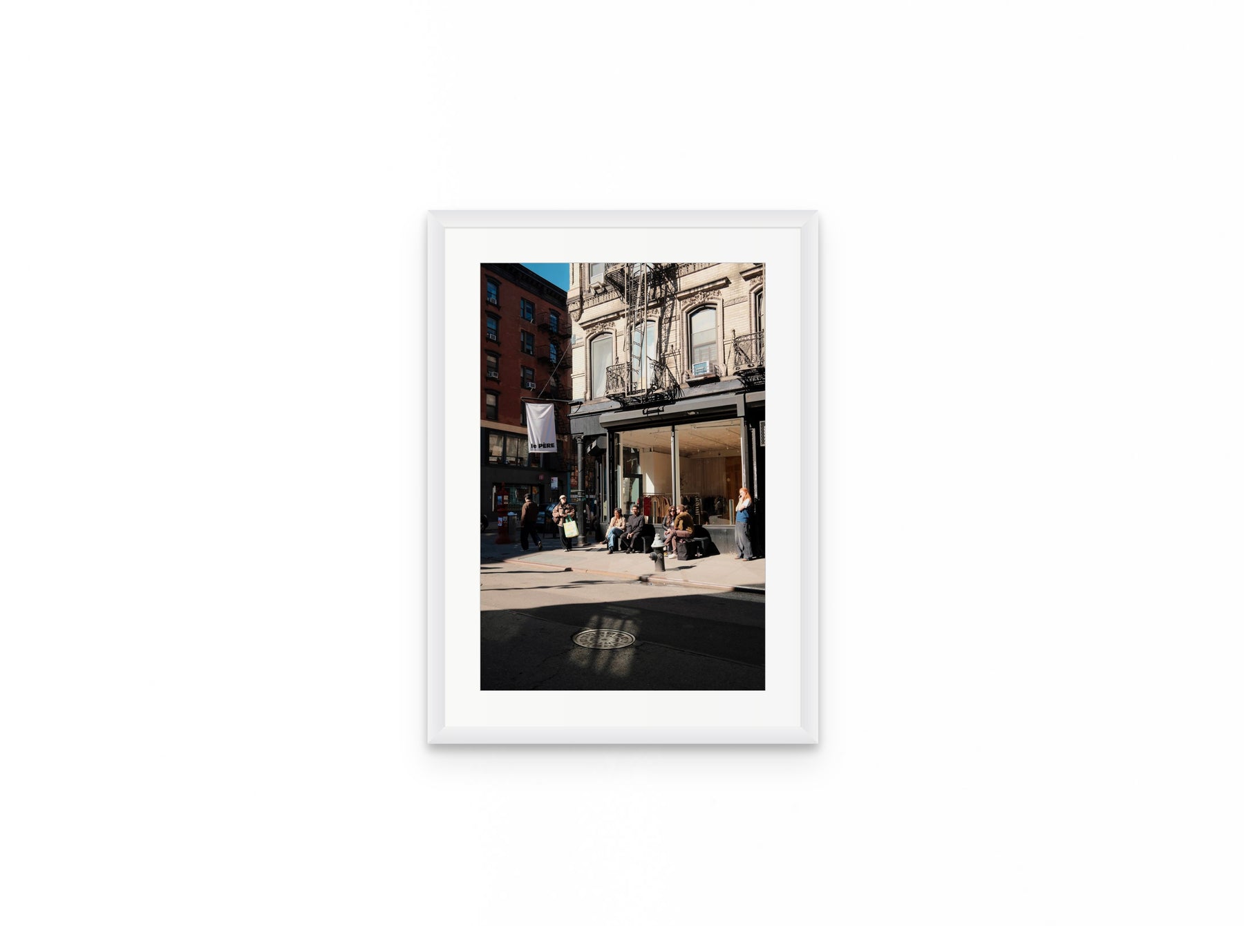Nolita Corner Sun, 12×18 in white frame