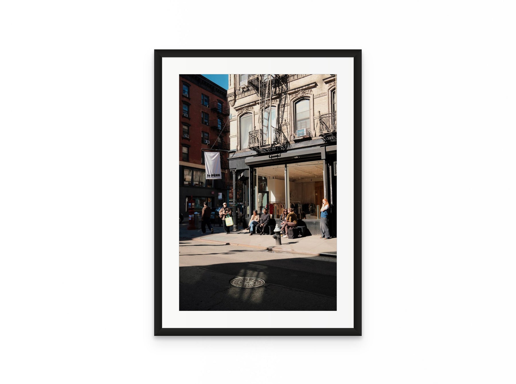 Nolita Corner Sun, 16×24 in black frame