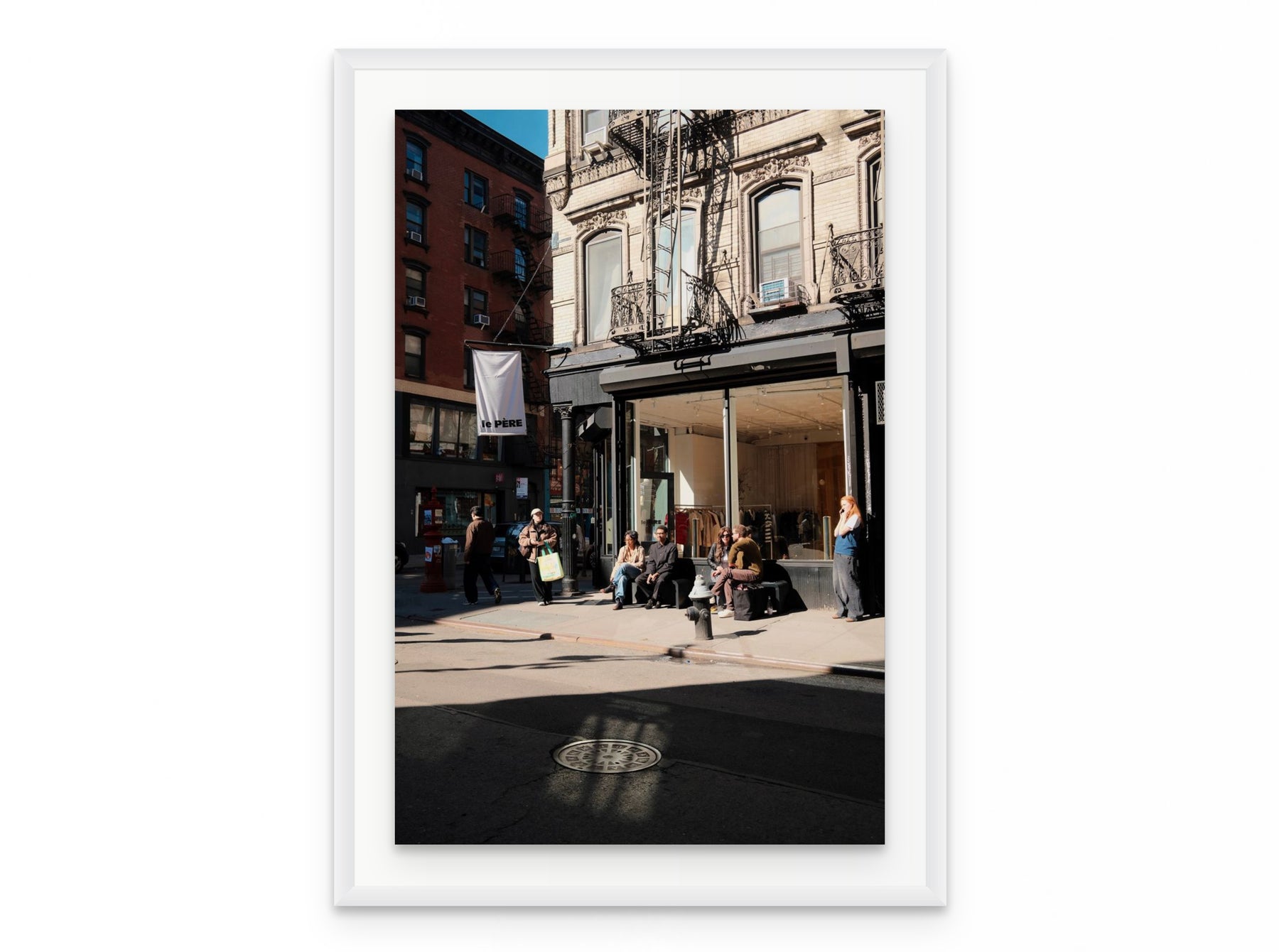 Nolita Corner Sun, 20×30 in white frame