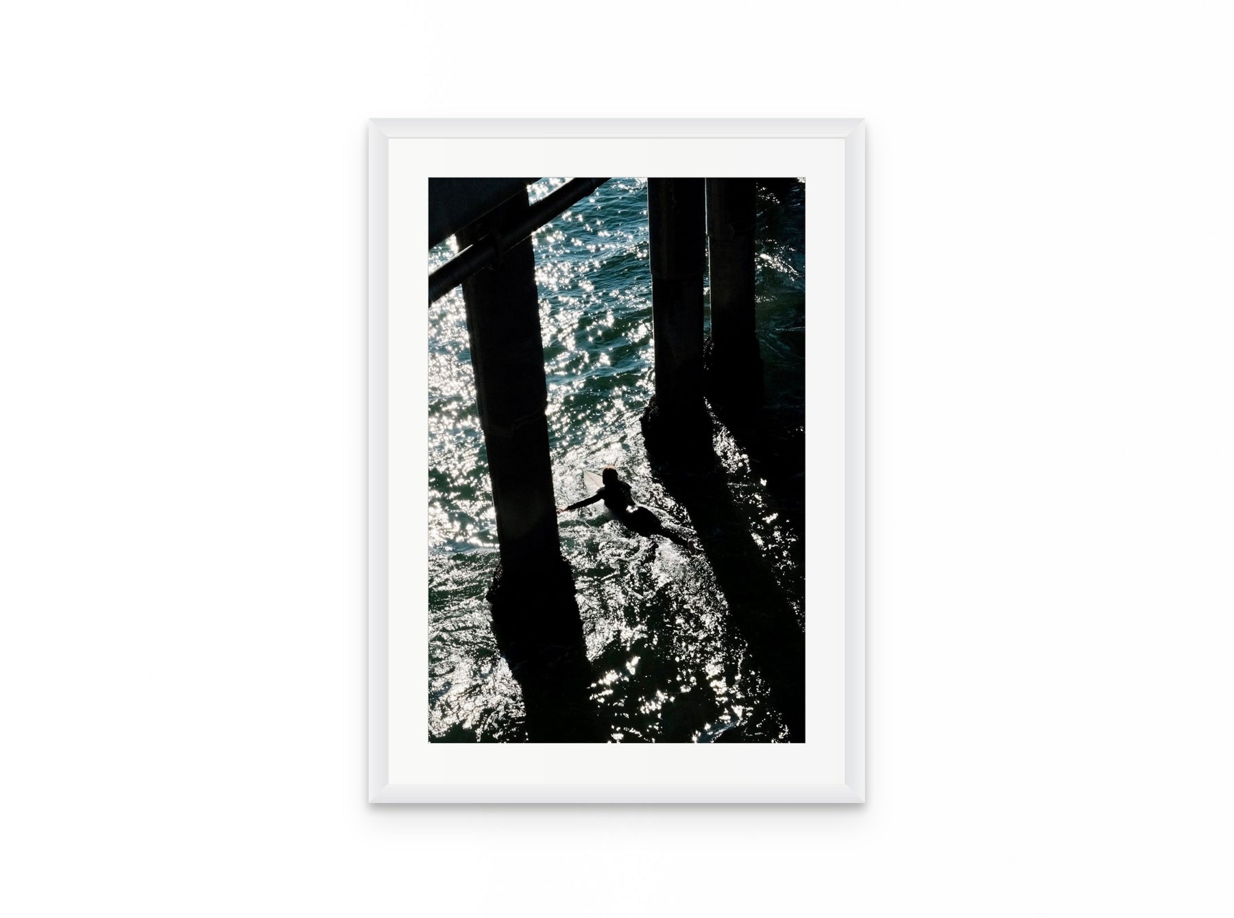 Pier Shadows Surfer, 16×24 in white frame