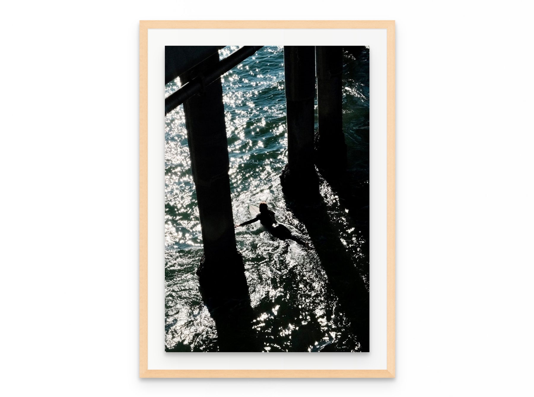 Pier Shadows Surfer, 20×30 in natural frame
