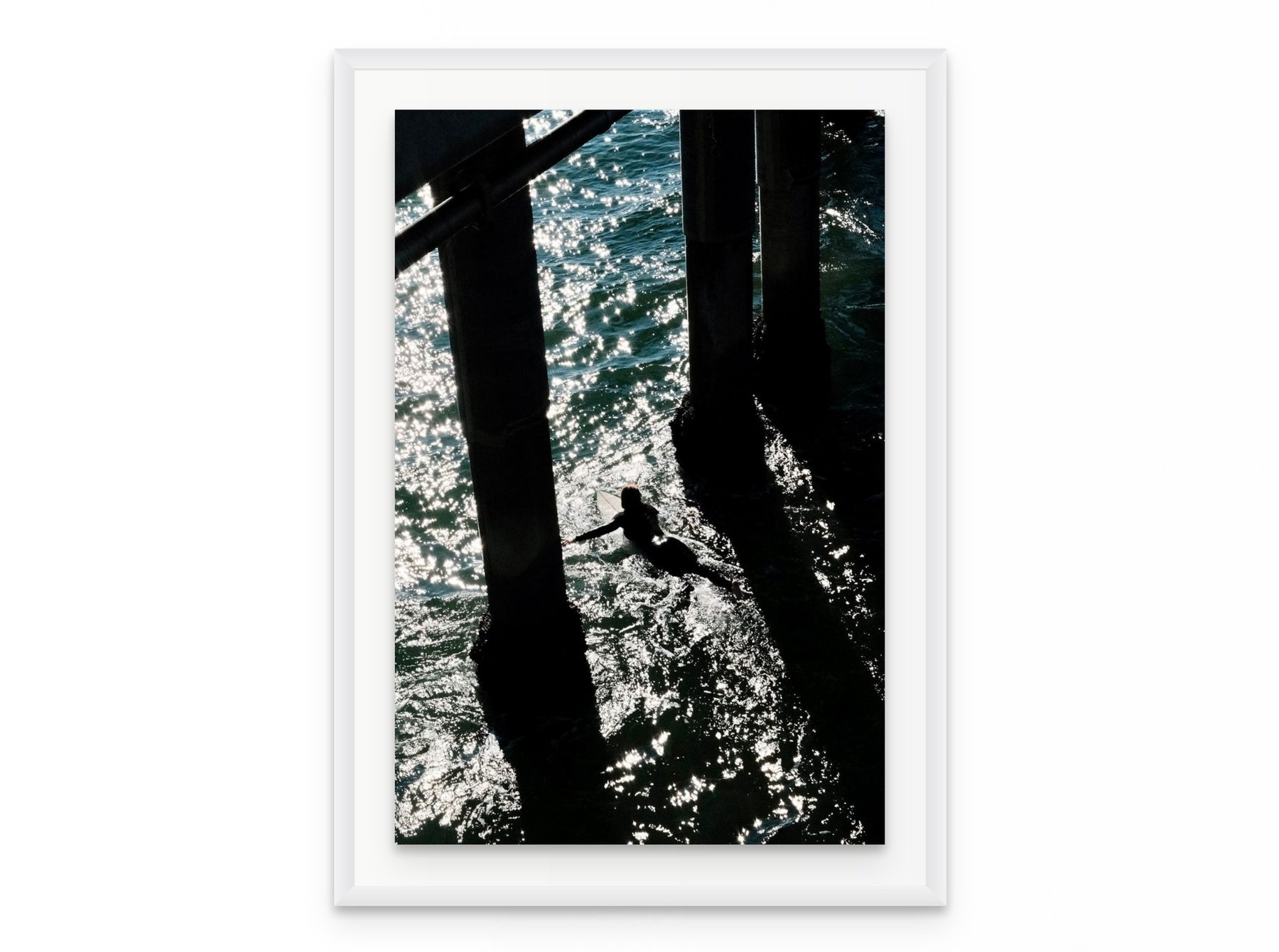 Pier Shadows Surfer, 20×30 in white frame