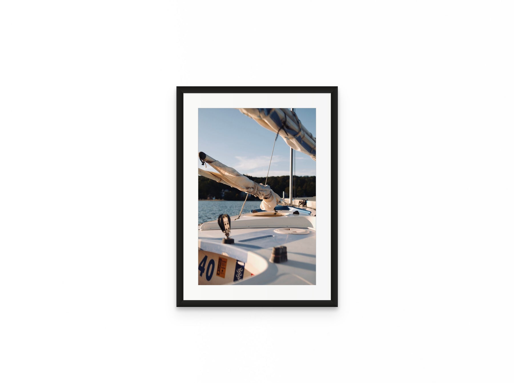 Sailboat Bow Golden, 12×18 in black frame