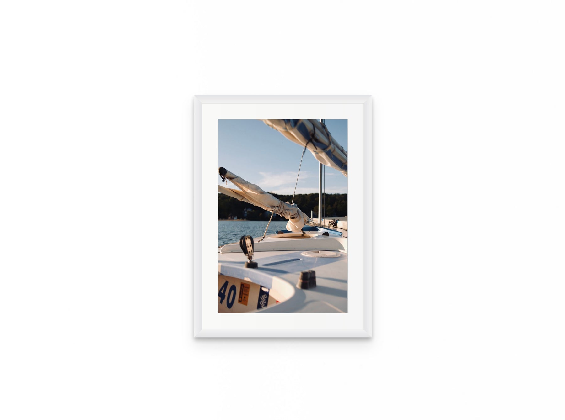Sailboat Bow Golden, 12×18 in white frame
