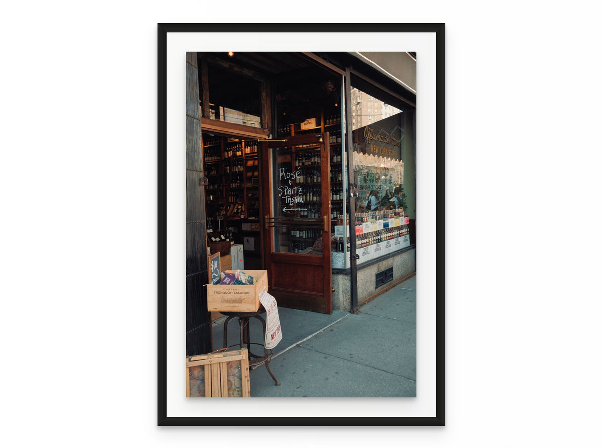 Wine Shop Rose, 20×30 in black frame